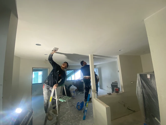 Painting crew at work interior